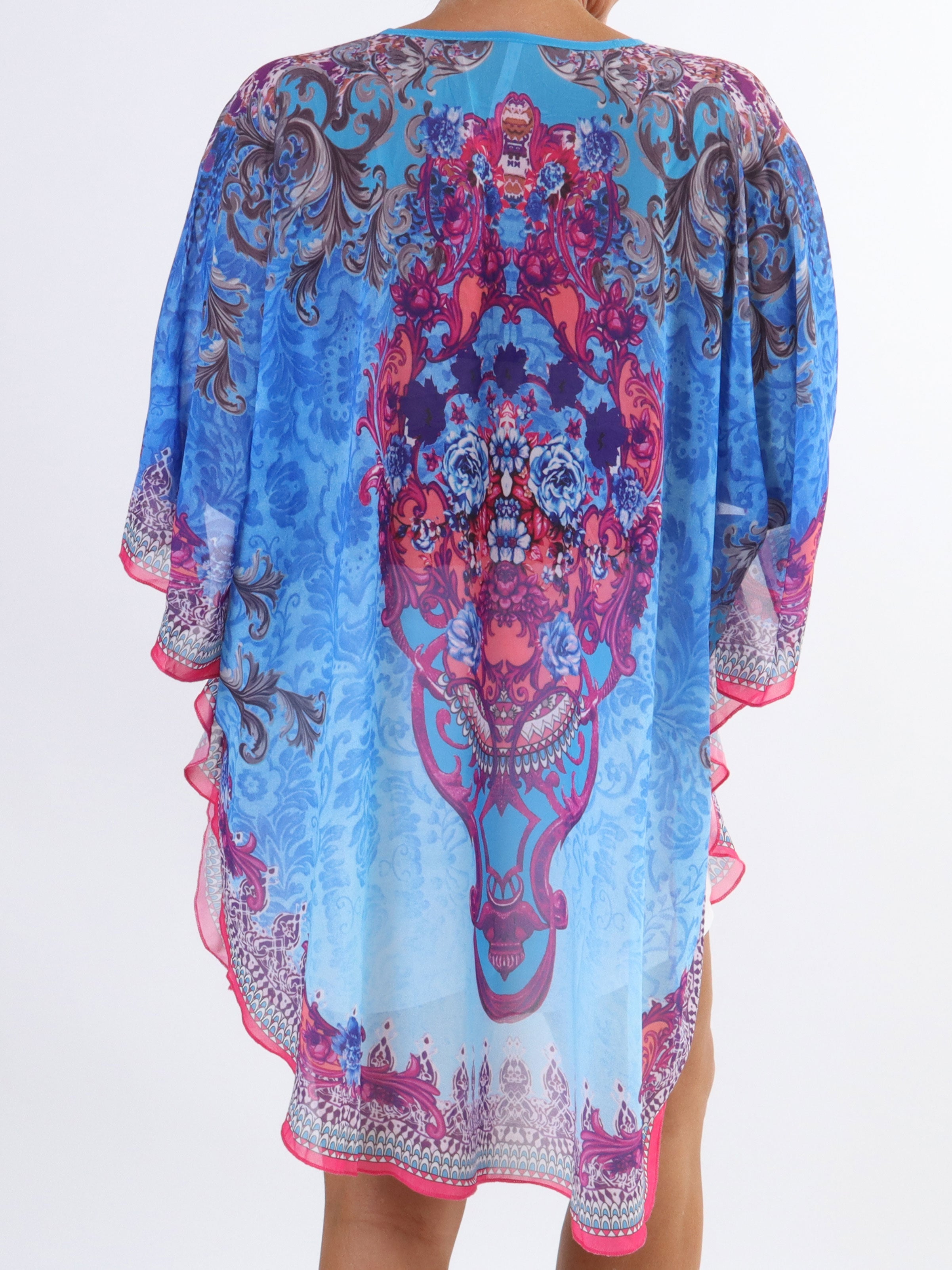 Sigga - Halvtransparent tunika med fuskpälskant i plusstorlek